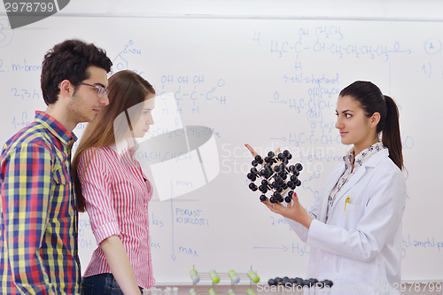 Image of happy teens group in school