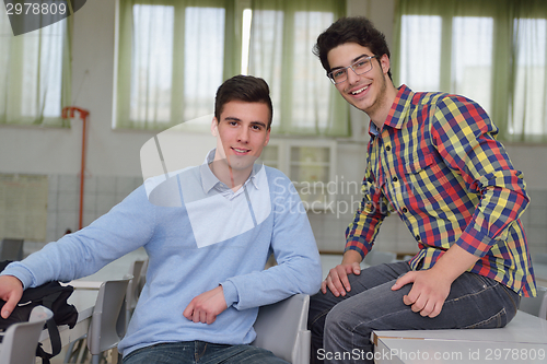 Image of happy teens group in school