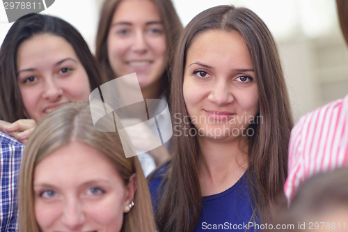 Image of happy teens group in school