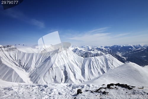 Image of Snowy mountains at sun day