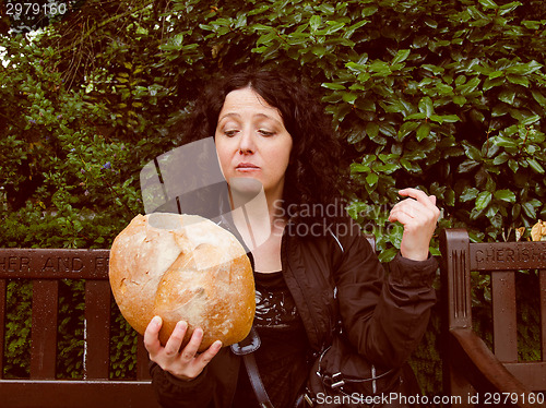 Image of Girl eating bread