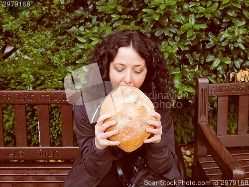 Image of Girl eating bread