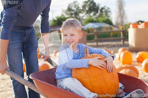 Image of family at pumpkin patch