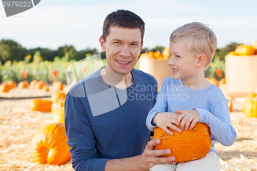 Image of family at pumpkin patch