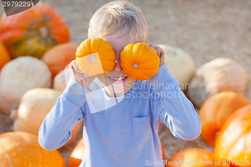 Image of kid at pumpkin patch