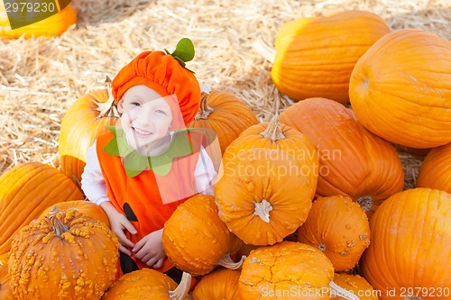 Image of kid at pumpkin patch