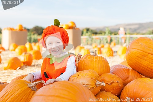 Image of kid at pumpkin patch