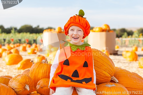 Image of kid at pumpkin patch