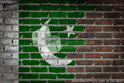 Image of Brick wall texture with flag