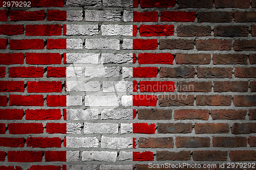 Image of Brick wall texture with flag