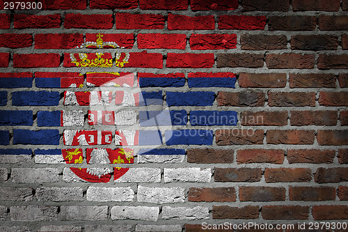 Image of Brick wall texture with flag