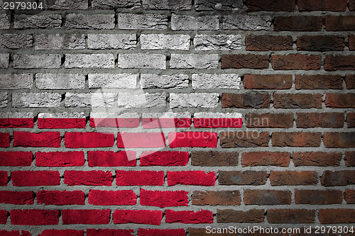 Image of Brick wall texture with flag