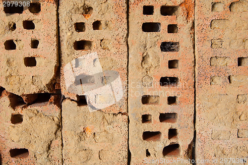 Image of Four old bricks on a row