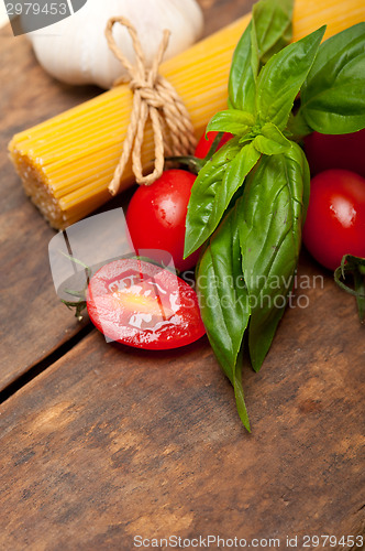 Image of Italian spaghetti pasta tomato and basil