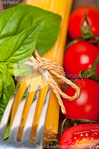 Image of Italian spaghetti pasta tomato and basil