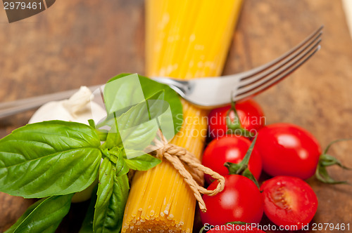 Image of Italian spaghetti pasta tomato and basil