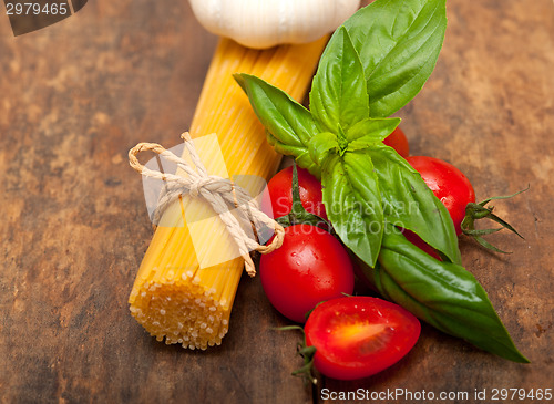 Image of Italian spaghetti pasta tomato and basil