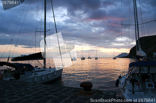 Image of Sailing boats and sunset