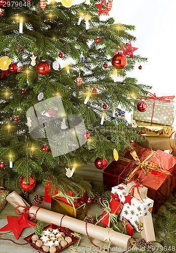 Image of christmas tree with many presents