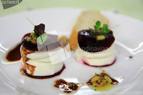 Image of fresh goat cheese and red beet 