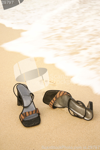 Image of Kick off your heels - Sandals on seashore