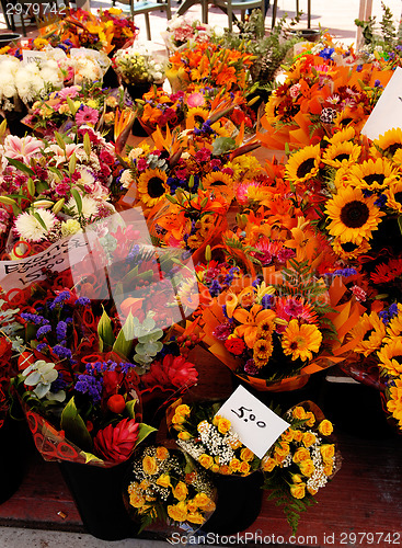 Image of A colorful flower stall.