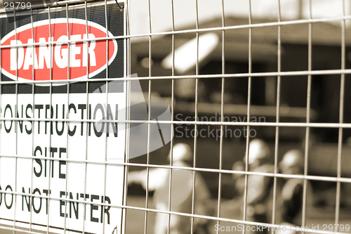 Image of Signage and construction workers
