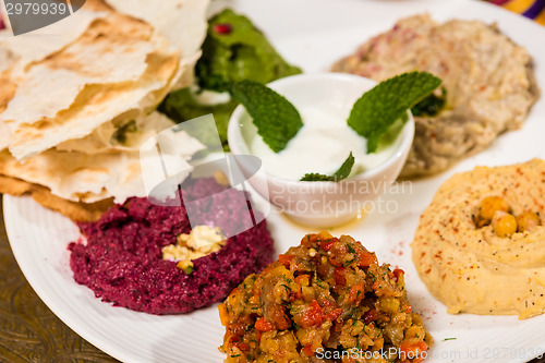 Image of assorted of oriental food, mezze