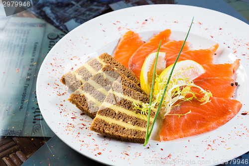 Image of Salmon snack on the white plate,