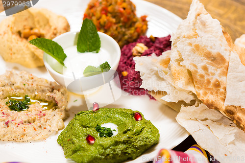 Image of assorted of oriental food, mezze