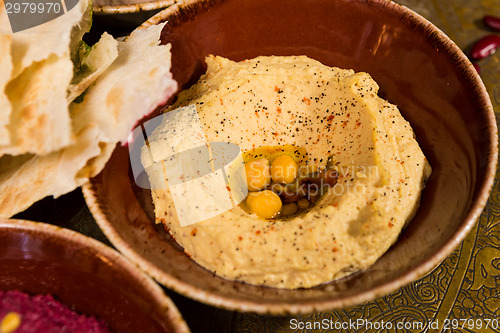 Image of bowl of creamy hummus