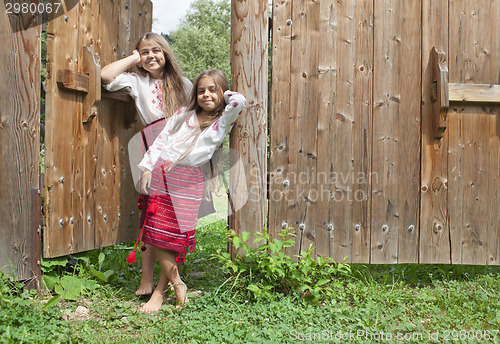 Image of Sisters outside home