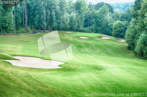 Image of luxurious golf course on a cloudy day