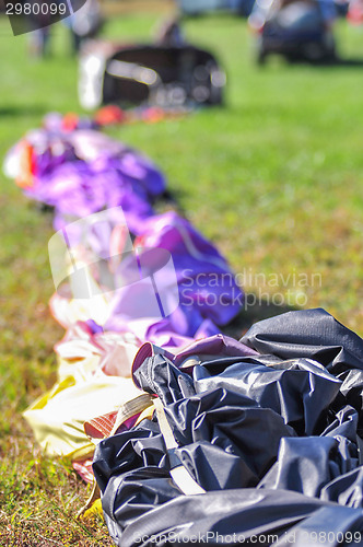 Image of hot air balloon ready for assembly on a field