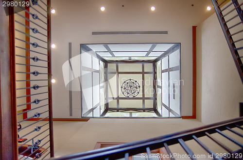 Image of looking up toward ceiling in the stairwell