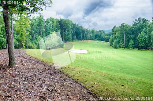 Image of luxurious golf course on a cloudy day