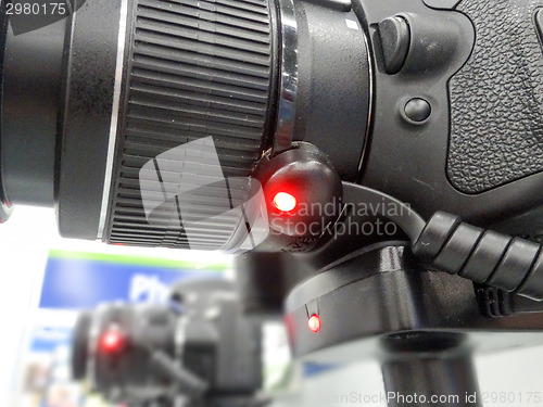 Image of closeup of dslr cameras on diplay in store