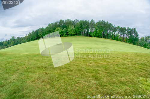 Image of luxurious golf course on a cloudy day