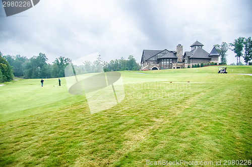 Image of luxurious golf course on a cloudy day