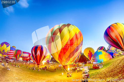 Image of Bright Hot Air Balloons Glowing at Night