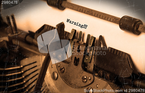 Image of Old typewriter with paper