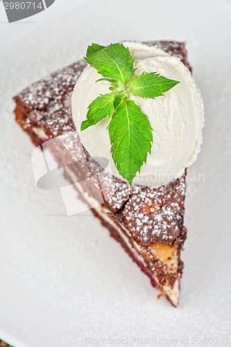 Image of chocolate cake with jam ice cream