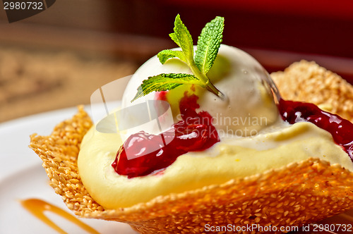 Image of cake with jam ice cream