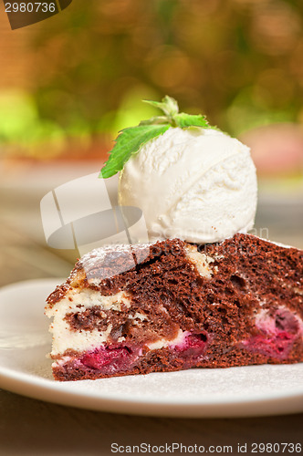 Image of chocolate cake with jam ice cream