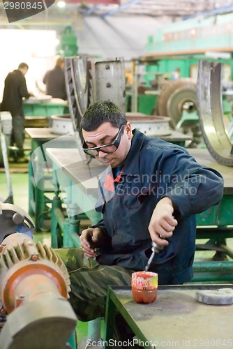 Image of Mechanic on workplace