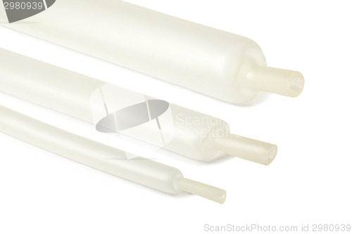 Image of Three white shrink sleeves