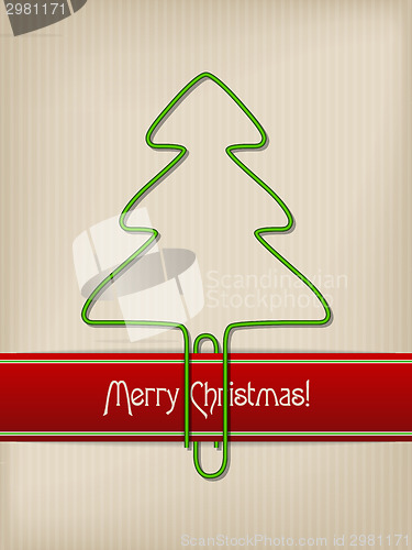 Image of Striped christmas greeting with tree shaped paper clip