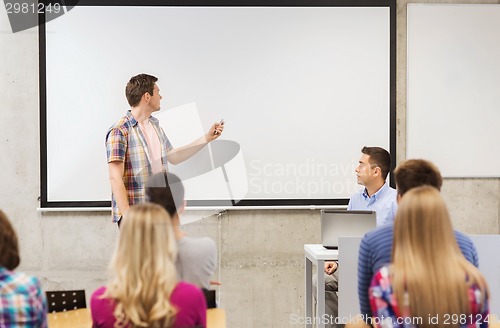 Image of group of students and teacher in classroom