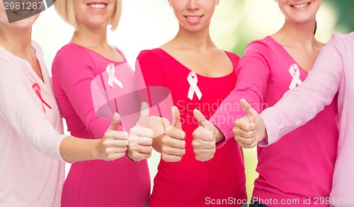 Image of close up of women with cancer awareness ribbons