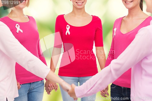 Image of close up of women with cancer awareness ribbons